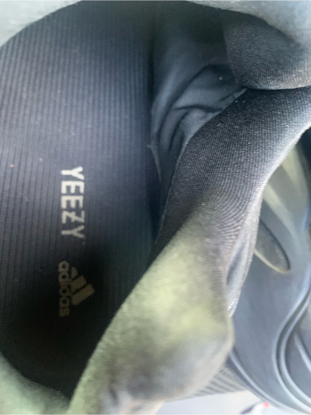 Yeezy Black Slip-On Sneaker with Subtle Olive Tint